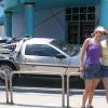 Jo and Jess in front of the delorian